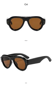 Front and side views of thick oval sunglasses with retro studs and tinted lenses