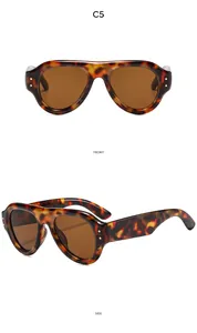 Detailed front and side views of thick oval tortoiseshell sunglasses with brown lenses