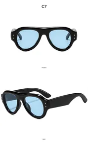 Front and side views of black retro oval sunglasses with light blue lenses and gold rivets