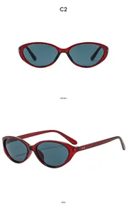 Front and side view of cat-eye sunglasses with burgundy translucent frames and gray lenses