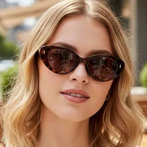 Retro cat-eye sunglasses with tortoiseshell frame and metallic rivet detailing for women