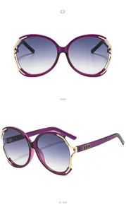 Vues de face et de profil de lunettes de soleil violet dégradé avec bande dorée décorative