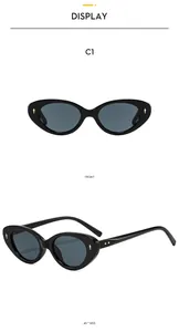 Front and 45-degree side views of black cat-eye sunglasses with gold diamond rivets