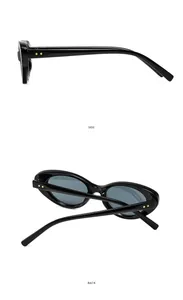 Detail view of oval retro sunglasses showing side and back angles with metal rivets
