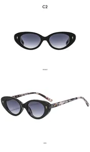 Detail view of vintage cat-eye sunglasses with tortoiseshell temples and C2 color code