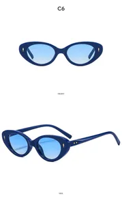 Front and side views of vintage cat eye sunglasses in dark blue with gradient lenses