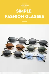 Detail of retro oval metal sunglasses in multiple colors with arrow temple decoration