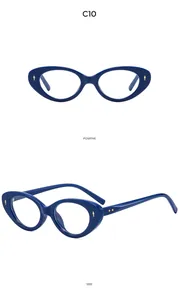Detail view of dark blue cat eye sunglasses frame with elegant golden diamond-shaped studs