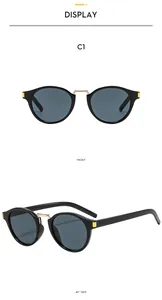 Front and 45-degree side view of vintage cat-eye sunglasses with gold metal bridge