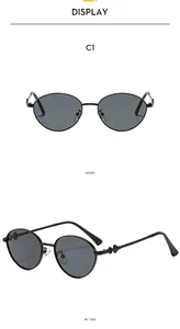 Front and 45 degree side view of vintage oval black metal frame sunglasses for parties