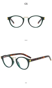 Front and side views of dark green round cat-eye sunglasses with tortoiseshell temples