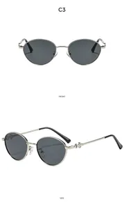 Front and side views of silver vintage oval sunglasses with decorative metal hinges
