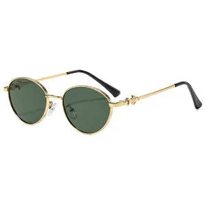Vintage oval sunglasses with dark green lenses and engraved gold metal frame for outdoor style