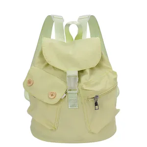 Light green casual canvas backpack with flap cover and white buckle for women