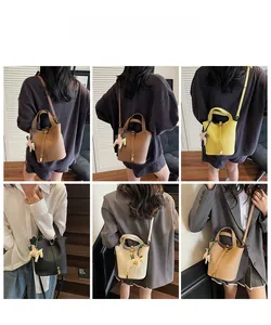 Litchi texture leather bucket bag shown in multiple colors with horse charm detail