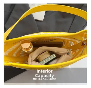 Top view of striped mesh tote bag capacity showing interior space with a drawstring pouch