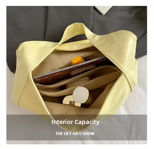 Detail view of large tote bag interior capacity with multi-layer compartments and pockets
