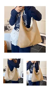 Detail view of large beige hobo tote bag in lychee pattern leather for women