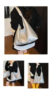 Silver metallic hobo tote bag detail with matching detachable zipper coin pouch set