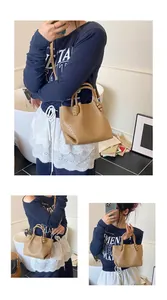 Detail showing woven leather texture and knot handle on a brown bucket shoulder bag