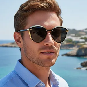 Fashionable oversized cat-eye sunglasses with gold metal trim for women on beach holiday