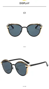 Front and 45-degree side view of cat eye sunglasses with gold metal trim details