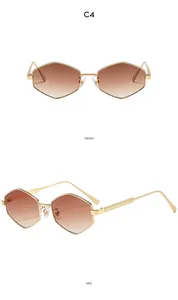 Close-up of gold hexagonal metal sunglasses with brown gradient lenses and textured arms