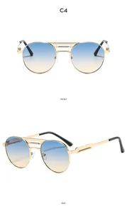 Détail de lunettes aviateur en métal doré à double pont et verres dégradés colorés