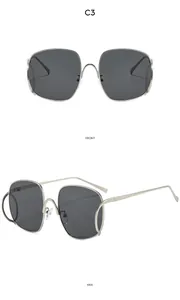Vue de face et de profil de lunettes de soleil punk en métal argenté avec verres gris