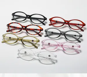Flat lay of vintage oval sunglasses JH1873 in seven colors on a light gray background