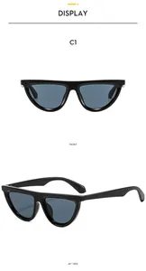 Front and side view of retro black cat-eye sunglasses with dark lenses for fashion