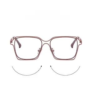Detail view of rose gold geometric double-frame glasses with minimalist metal design