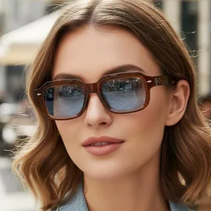 Square brown resin sunglasses with light blue lenses and silver rivets for street style