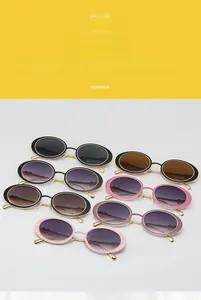 Detailed display of retro oval sunglasses with metal temples in various color options