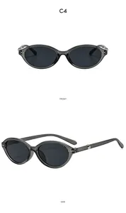 Front and side view of Y2K cat-eye sunglasses with transparent grey frames and dark lenses