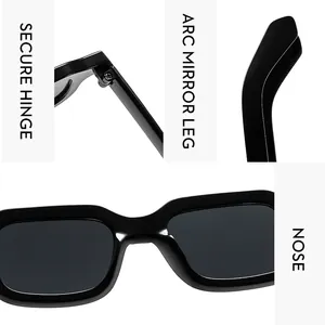 Detail view of black rectangular sunglasses featuring metal hinges and ergonomic temples