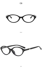 Detail of black cat eye sunglasses showing front and side views with silver dot accents