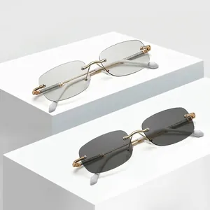 Lunettes de soleil Y2K sans monture photochromiques avec branches dorées pour femmes