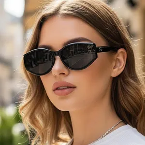 Fashionable black cat eye sunglasses for women with metal logo detail on temples