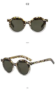Vues détaillées avant et latérale de lunettes de soleil rondes vintage en écaille