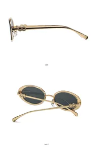 Detailed side and back view of oval gold metal sunglasses with ornate hollow hinge design