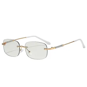 Lunettes de soleil sans monture Y2K avec monture dorée et détails pailletés chic