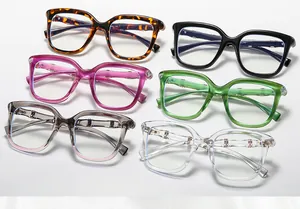 Detail showing variety of colorful chunky frame sunglasses with metal accents on temples