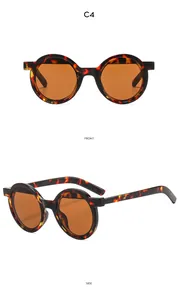 Lunettes de soleil rondes rétro en écaille avec verres orange-brun, vues de face et de profil