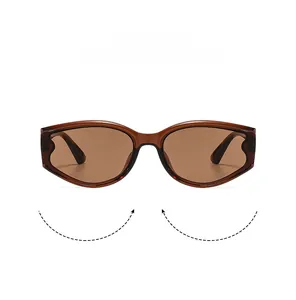 Detailed view of cat eye sunglasses with brown oval resin frames and matching lenses