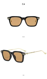 Vue de face et de profil des lunettes de soleil carrées C4 avec verres ambrés et branches d'or