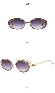 Detail view of oval vintage sunglasses with gold temples and purple gradient lenses