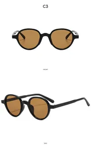Detailed front and side views of round retro sunglasses with black frames and amber lenses