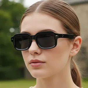 Classic rectangle black frame sunglasses with silver rivets for a retro street style look