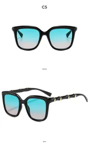 Front and side view of oversized vintage sunglasses with bamboo legs and gold accents